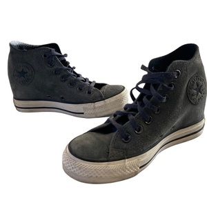 Suede high top Converse Chuck Taylor’s wedges.